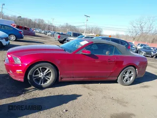 2014 Ford Mustang V6 with VIN 1ZVBP8EMXE5228061, listed as a IAAI auction lot 41603552 with 118,011 mi miles. Bid and sale history available at carsss.com. Image 14.