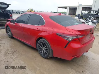 2023 Toyota Camry SE with VIN 4T1T11AK8PU115234, listed as a IAAI auction lot 41909954 with 56,346 mi miles and . Bid and sale history available at DreamBid. Image 3.