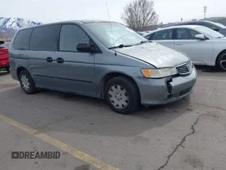 2000 Honda Odyssey LX z VIN 2HKRL1858YH589866, wystawiony jako IAAI lot #41854381 z przebiegiem 209 330 mil mil oraz . Historia ofert i sprzedaży dostępna na DreamBid. Obrazek 1.