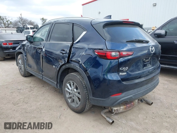 2023 Mazda CX-5 S Carbon Edition z VIN JM3KFBCM4P0288155, wystawiony jako IAAI lot #41501030 z przebiegiem 26 516 mil mil oraz . Historia ofert i sprzedaży dostępna na DreamBid. Obrazek 3.