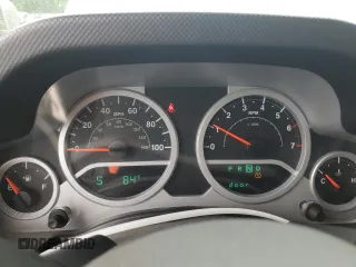 2008 Jeep Wrangler Rubicon z VIN 1J8GA69198L614736, wystawiony jako Copart lot #50826545 z przebiegiem 124 801 mil mil oraz Czysty tytuł • Clean title. Historia ofert i sprzedaży dostępna na DreamBid. Obrazek 9.