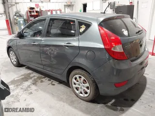 2013 Hyundai Accent GL with VIN KMHCT5AEXDU100208, listed as a IAAI auction lot 41517792 with 164,510 mi miles. Bid and sale history available at carsss.com. Image 3.