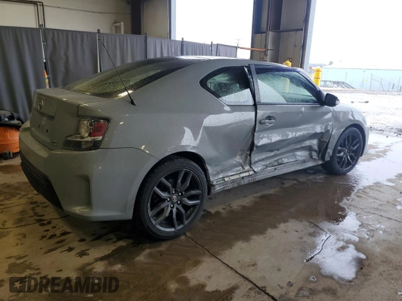 2014 Scion tC z VIN JTKJF5C7XE3071780, wystawiony jako Copart lot #47220975 z przebiegiem 102 630 mil mil oraz Szkody całkowita. Historia ofert i sprzedaży dostępna na DreamBid. Obrazek 3.