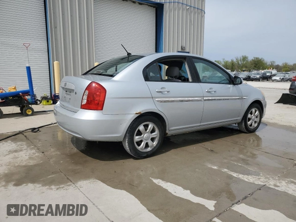 2006 Hyundai Accent GLS with VIN KMHCN46C46U048752, listed as a Copart auction lot 52930035 with 143,688 mi miles and Salvage title. Bid and sale history available at DreamBid. Image 3.