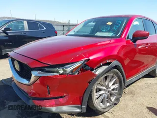 2019 Mazda CX-5 Grand Touring with VIN JM3KFADM5K1556917, listed as a IAAI auction lot 41706323 with 77,804 mi miles. Bid and sale history available at carsss.com. Image 6.