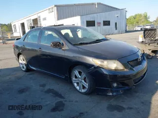 2009 Toyota Corolla XRS with VIN 1NXBE40E59Z003796, listed as a IAAI auction lot 42077772 with 215,159 mi miles. Bid and sale history available at carsss.com. Image 1.