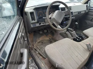 1988 Nissan Hardbody E z VIN 1N6ND16Y4JC384522, wystawiony jako Copart lot #64570204 z przebiegiem 10 784 mil mil oraz Szkody całkowita. Historia ofert i sprzedaży dostępna na DreamBid. Obrazek 8.