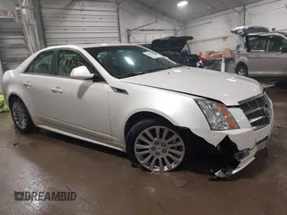 2011 Cadillac CTS Premium with VIN 1G6DS5ED5B0119012, listed as a IAAI auction lot 41488630 with 122,184 mi miles. Bid and sale history available at carsss.com. Image 1.