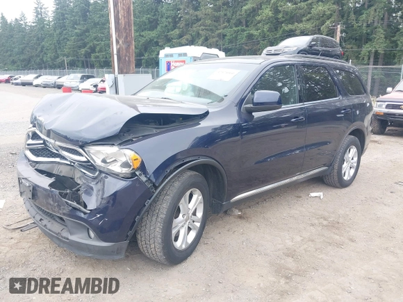 2013 Dodge Durango SXT with VIN 1C4RDJAG5DC697022, listed as a IAAI auction lot 42474060 with 159,723 mi miles and . Bid and sale history available at DreamBid. Image 17.