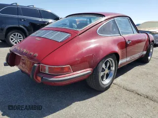 1969 Porsche 911 with VIN 119200792, listed as a Copart auction lot 49263235 with 9,446 mi miles and Salvage title. Bid and sale history available at DreamBid. Image 3.