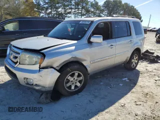 2010 Honda Pilot Touring with VIN 5FNYF3H84AB002687, listed as a Copart auction lot 80246724 with 210,934 mi miles and Salvage Title. Bid and sale history available at carsss.com. Image 1.