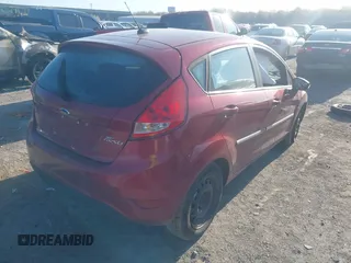 2013 Ford Fiesta SE with VIN 3FADP4EJ0DM171765, listed as a IAAI auction lot 42106666 with 149,873 mi miles and . Bid and sale history available at DreamBid. Image 4.