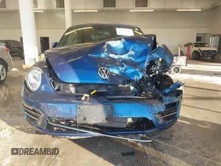 2018 Volkswagen Beetle S с VIN 3VW5DAAT2JM515005, выставлен на аукционе IAAI как лот 41093518 с пробегом Не указан миль и . История ставок и продаж доступна на DreamBid. Изображение 11.