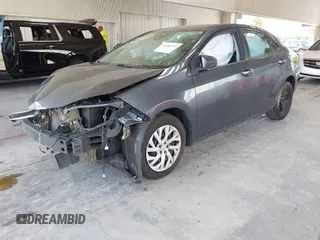 2018 Toyota Corolla L z VIN 5YFBURHE0JP802699, wystawiony jako IAAI lot #42486454 z przebiegiem 134 040 mil mil oraz . Historia ofert i sprzedaży dostępna na DreamBid. Obrazek 2.