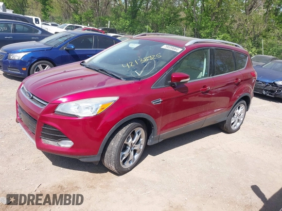 2014 Ford Escape Titanium with VIN 1FMCU0JX8EUC19300, listed as a IAAI auction lot 42138925 with 111,709 mi miles. Bid and sale history available at carsss.com. Image 2.