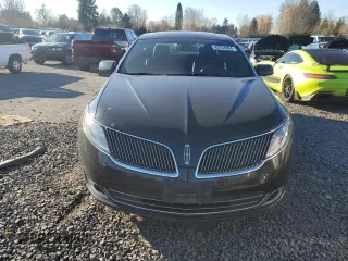 2014 Lincoln MKS EcoBoost with VIN 1LNHL9FT2EG600500, listed as a Copart auction lot 83764694 with 74,949 mi miles and Salvage title. Bid and sale history available at DreamBid. Image 5.