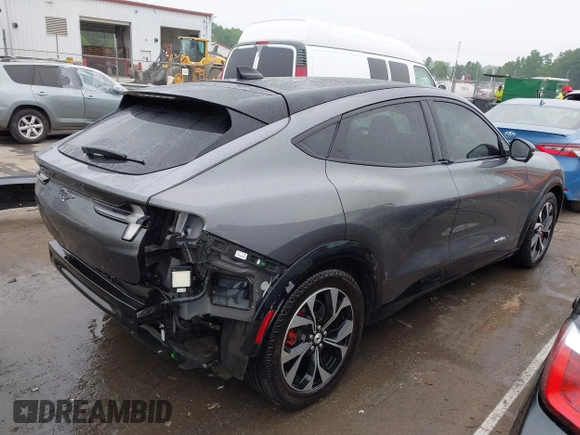 2021 Ford Mustang Mach-E Premium z VIN 3FMTK3R74MMA27709, wystawiony jako IAAI lot #42102335 z przebiegiem 54 988 mil mil oraz . Historia ofert i sprzedaży dostępna na DreamBid. Obrazek 4.