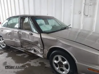 1996 Oldsmobile LSS z VIN 1G3HY5217T4809863, wystawiony jako IAAI lot #41623766 z przebiegiem 186 701 mil mil oraz . Historia ofert i sprzedaży dostępna na DreamBid. Obrazek 6.
