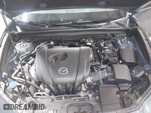 2022 Mazda CX-30 S Carbon Edition with VIN 3MVDMBCL8NM447234, listed as a IAAI auction lot 42511600 with 51,926 mi miles and . Bid and sale history available at DreamBid. Image 10.