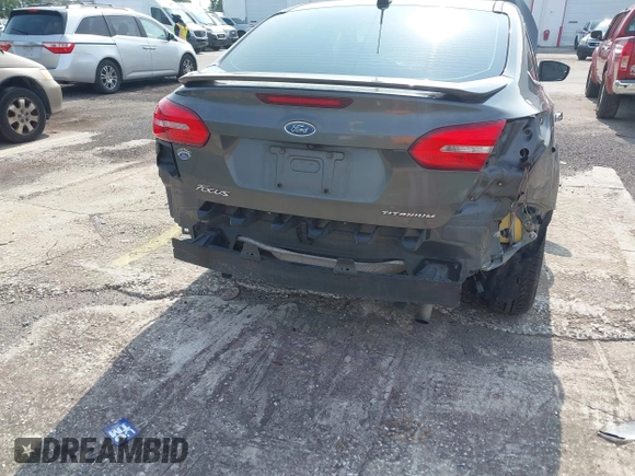 2018 Ford Focus Titanium с VIN 1FADP3J23JL272028, выставлен на аукционе IAAI как лот 42395402 с пробегом 125 975 миль миль и . История ставок и продаж доступна на DreamBid. Изображение 6.