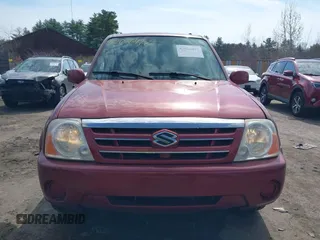 2004 Suzuki XL-7 LX with VIN JS3TX92V044105157, listed as a IAAI auction lot 42036497 with 244,104 mi miles. Bid and sale history available at carsss.com. Image 6.