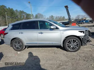 2019 Infiniti QX60 Luxe with VIN 5N1DL0MN8KC555323, listed as a IAAI auction lot 41824366 with 83,596 mi miles and . Bid and sale history available at DreamBid. Image 14.
