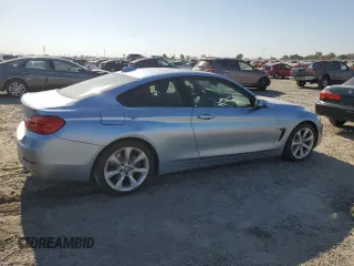2014 BMW 4 Series 435i with VIN WBA3R1C55EK191486, listed as a Copart auction lot 64141605 with 59,568 mi miles and Salvage title. Bid and sale history available at DreamBid. Image 3.