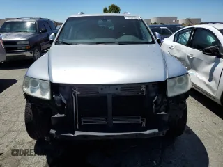 2004 Volkswagen Touareg z VIN WVGCM77L74D059969, wystawiony jako Copart lot #68238193 z przebiegiem Nie podano mil oraz Szkody całkowita. Historia ofert i sprzedaży dostępna na DreamBid. Obrazek 5.