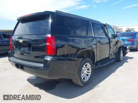 2020 Chevrolet Suburban LT z VIN 1GNSCHKC2LR305366, wystawiony jako IAAI lot #42080587 z przebiegiem 163 540 mil mil oraz . Historia ofert i sprzedaży dostępna na DreamBid. Obrazek 4.