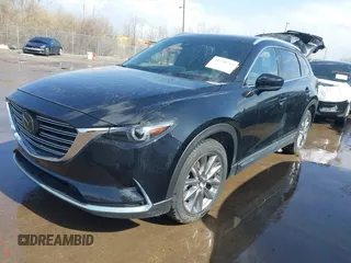2020 Mazda CX-9 Grand Touring with VIN JM3TCBDY2L0413839, listed as a IAAI auction lot 41720713 with 48,964 mi miles and . Bid and sale history available at DreamBid. Image 18.