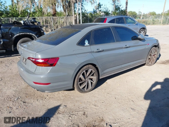 2019 Volkswagen Jetta GLI S z VIN 3VW6T7BU5KM169132, wystawiony jako IAAI lot #41599605 z przebiegiem 59 744 mil mil oraz . Historia ofert i sprzedaży dostępna na DreamBid. Obrazek 4.