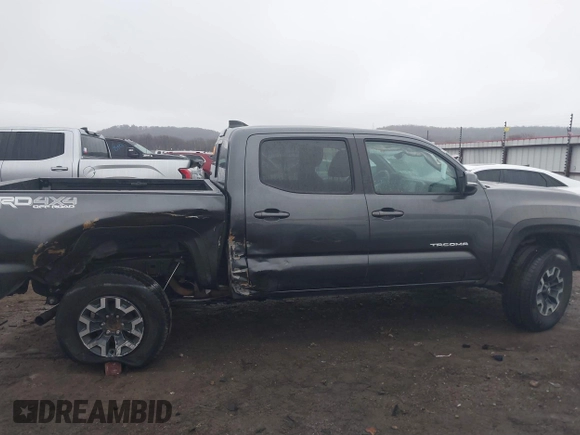 2022 Toyota Tacoma SR with VIN 3TMCZ5AN4NM476170, listed as a IAAI auction lot 41482149 with 57,126 mi miles and . Bid and sale history available at DreamBid. Image 13.