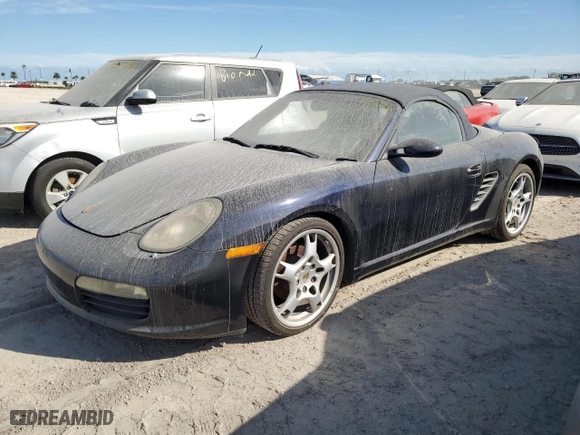 2007 Porsche Boxster with VIN WP0CA29897U710421, listed as a Copart auction lot 75128024 with 0 mi miles and Salvage Title. Bid and sale history available at carsss.com. Image 1.