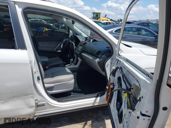 2015 Subaru Forester Touring with VIN JF2SJAWC0FH806493, listed as a IAAI auction lot 42355867 with 128,937 mi miles and . Bid and sale history available at DreamBid. Image 5.