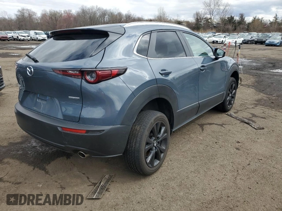 2023 Mazda CX-30 S Carbon Edition with VIN 3MVDMBCM7PM569904, listed as a Copart auction lot 52280755 with 18,963 mi miles and Salvage title. Bid and sale history available at DreamBid. Image 3.