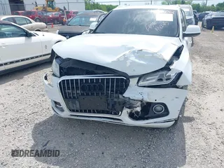 2014 Audi Q5 Premium Plus z VIN WA1CMAFP9EA041976, wystawiony jako IAAI lot #42296067 z przebiegiem 131 906 mil mil oraz . Historia ofert i sprzedaży dostępna na DreamBid. Obrazek 6.