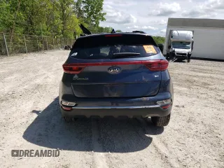 2021 Kia Sportage EX with VIN KNDPNCAC0M7847575, listed as a Copart auction lot 57667035 with Not provided miles and Salvage title. Bid and sale history available at DreamBid. Image 6.