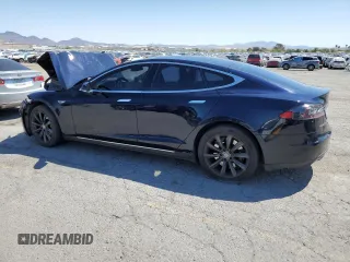 2014 Tesla Model S 60 with VIN 5YJSA1H13EFP38425, listed as a Copart auction lot 54156245 with 183,968 mi miles and Salvage title. Bid and sale history available at DreamBid. Image 2.
