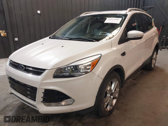 2016 Ford Escape Titanium with VIN 1FMCU9J94GUB02810, listed as a IAAI auction lot 41643907 with 119,684 mi miles. Bid and sale history available at carsss.com. Image 2.