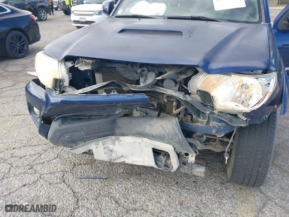 2015 Toyota Tacoma with VIN 3TMMU4FN0FM077148, listed as a IAAI auction lot 41274934 with 112,617 mi miles. Bid and sale history available at carsss.com. Image 6.