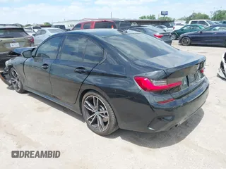 2021 BMW 3 Series 330i with VIN 3MW5R1J02M8B50832, listed as a IAAI auction lot 42032570 with 70,534 mi miles and . Bid and sale history available at DreamBid. Image 3.
