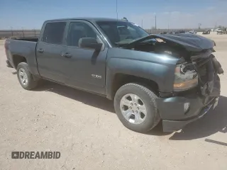 2018 Chevrolet Silverado 1500 LT with VIN 3GCUKREC2JG259864, listed as a Copart auction lot 49451735 with 146,576 mi miles and Salvage Title. Bid and sale history available at DreamBid. Image 4.