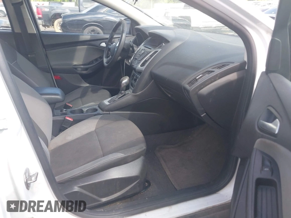 2014 Ford Focus SE z VIN 1FADP3K29EL387351, wystawiony jako IAAI lot #42167782 z przebiegiem 120 878 mil mil oraz . Historia ofert i sprzedaży dostępna na DreamBid. Obrazek 5.