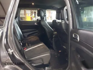2018 Jeep Grand Cherokee Laredo E with VIN 1C4RJFAG5JC343101, listed as a IAAI auction lot 41211158 with 105,886 mi miles. Bid and sale history available at carsss.com. Image 8.