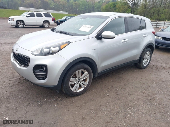 2017 Kia Sportage LX with VIN KNDPMCAC1H7140218, listed as a IAAI auction lot 42024024 with 129,799 mi miles. Bid and sale history available at carsss.com. Image 17.