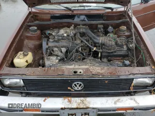 1979 Volkswagen Rabbit z VIN 1793863402, wystawiony jako Copart lot #79580954 z przebiegiem 82 349 mil mil oraz Tytuł czysty. Historia ofert i sprzedaży dostępna na DreamBid. Obrazek 11.