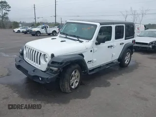 2022 Jeep Wrangler Unlimited Sport with VIN 1C4HJXDN2NW251041, listed as a IAAI auction lot 41558677 with 61,120 mi miles and . Bid and sale history available at DreamBid. Image 2.