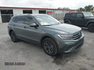 2024 Volkswagen Tiguan SE with VIN 3VVNB7AX4RM138429, listed as a IAAI auction lot 42303215 with Not provided miles and . Bid and sale history available at DreamBid. Image 1.