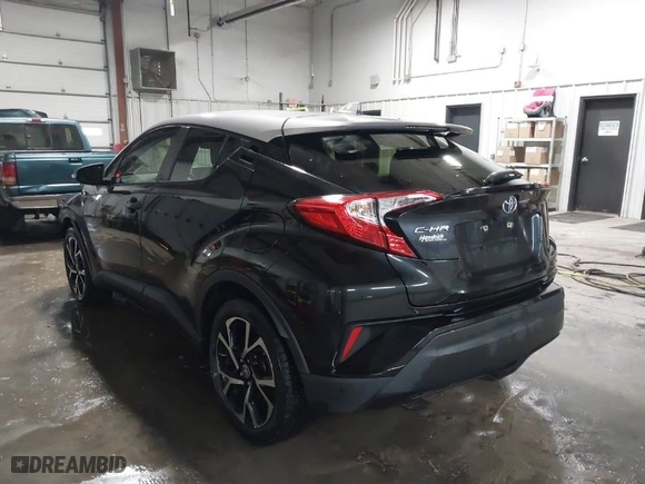 2020 Toyota C-HR LE with VIN JTNKHMBX2L1086683, listed as a IAAI auction lot 41572864 with 75,711 mi miles. Bid and sale history available at carsss.com. Image 3.