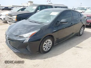 2016 Toyota Prius Two z VIN JTDKBRFU4G3509129, wystawiony jako IAAI lot #42321562 z przebiegiem 246 582 mil mil oraz . Historia ofert i sprzedaży dostępna na DreamBid. Obrazek 2.